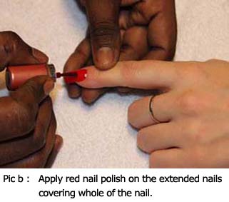 Apply red nail polish on the extended nails covering whole of the nail.